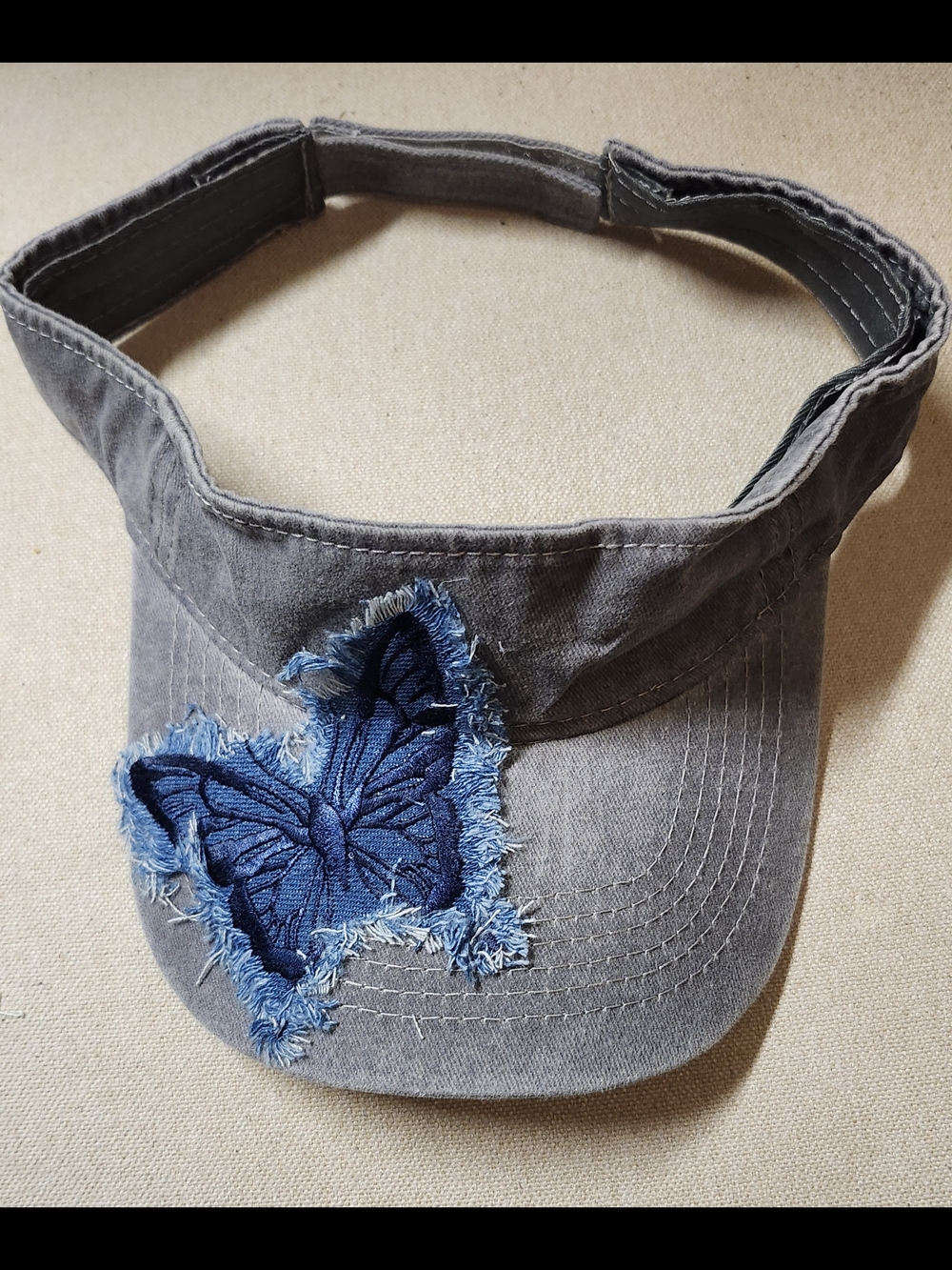 Hand Crafted Grey Visor Cap with Blue Frayed Butterfly Patch